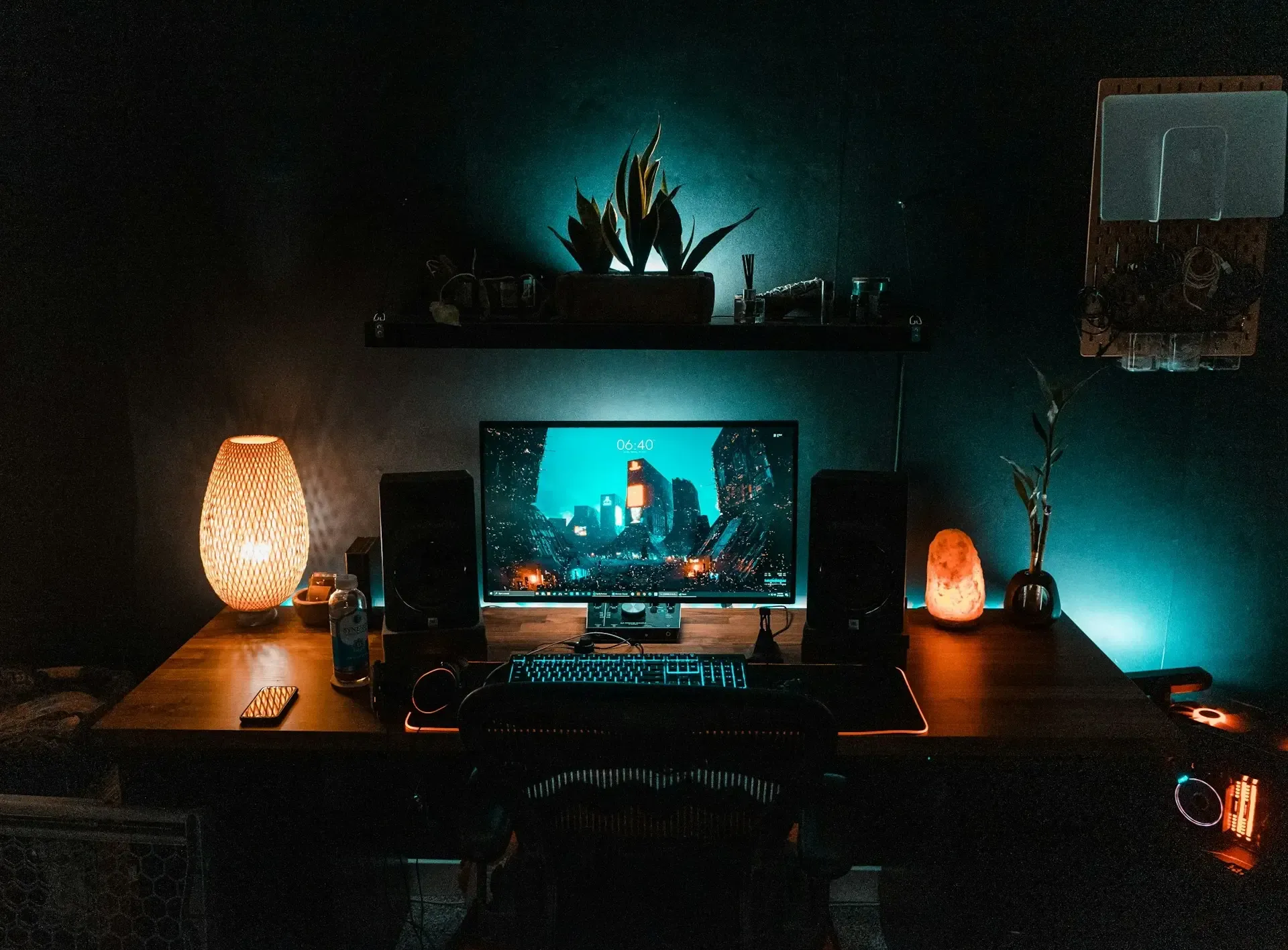 Beautiful gaming desk setup dark room blue lighting ambience