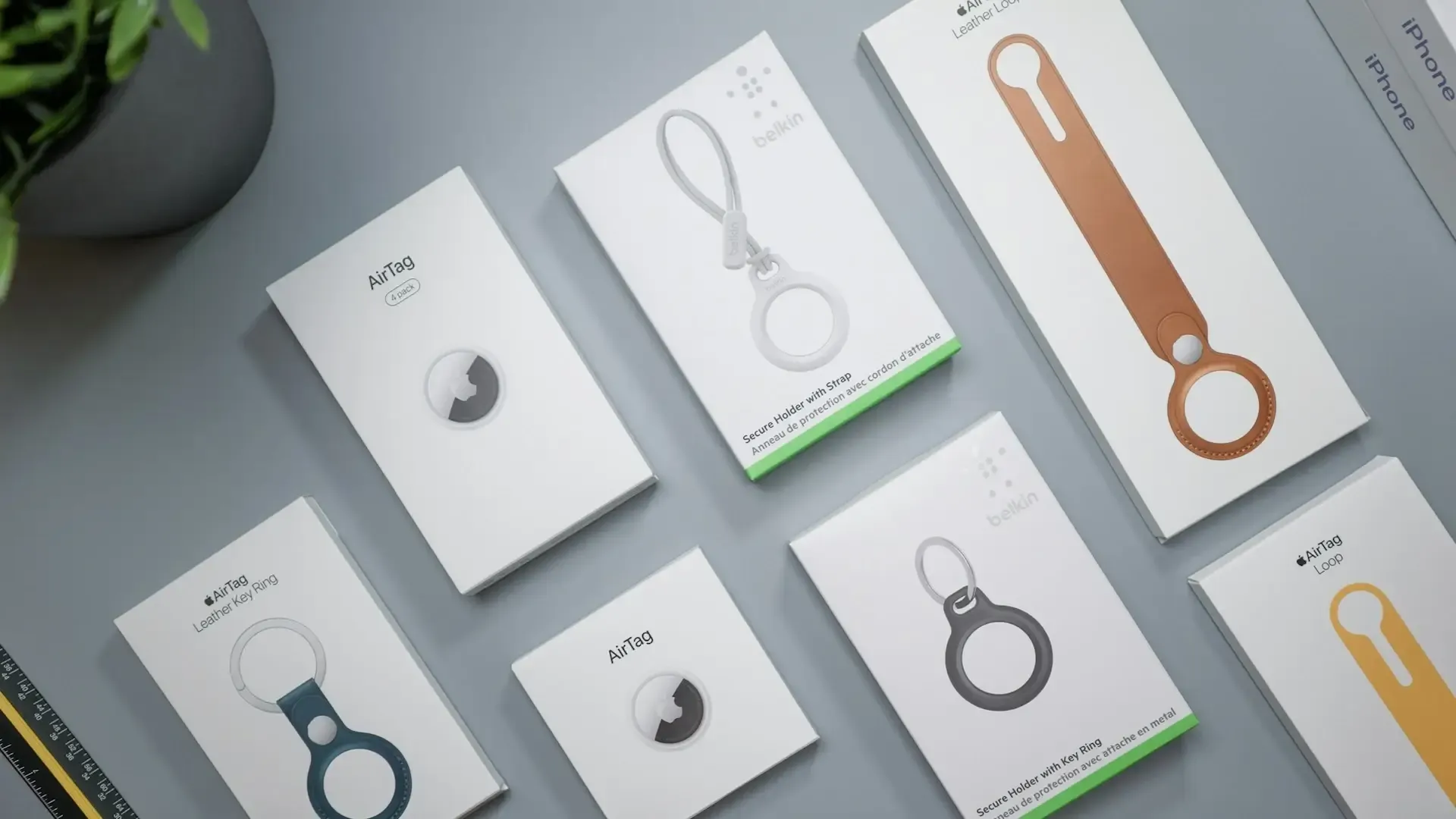 Apple airtag and belkin strap product boxes neatly organised